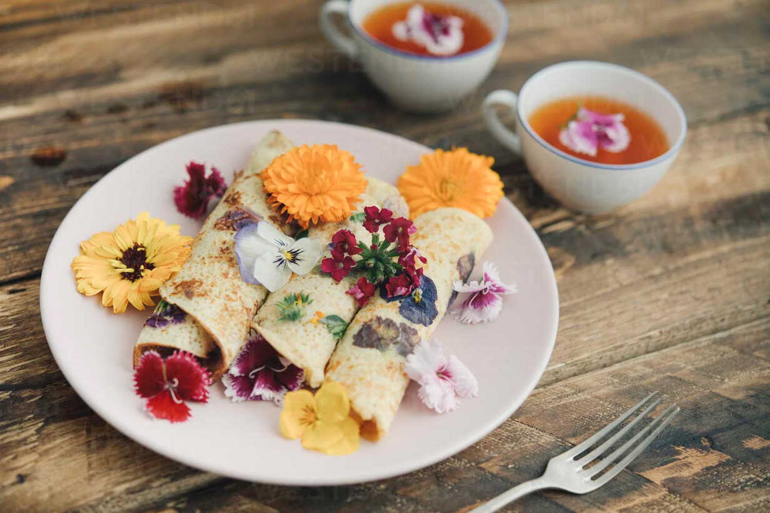 pancakes with edible flowers and infusion of red flowers SKCF00422