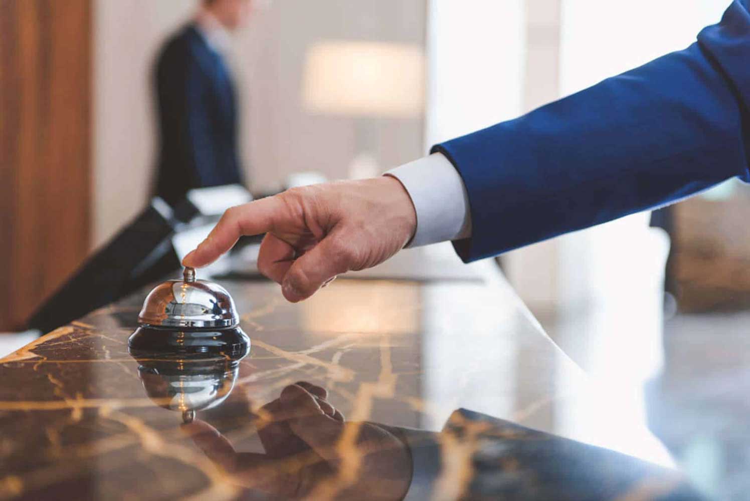 Front Office Receptionist greeting guest