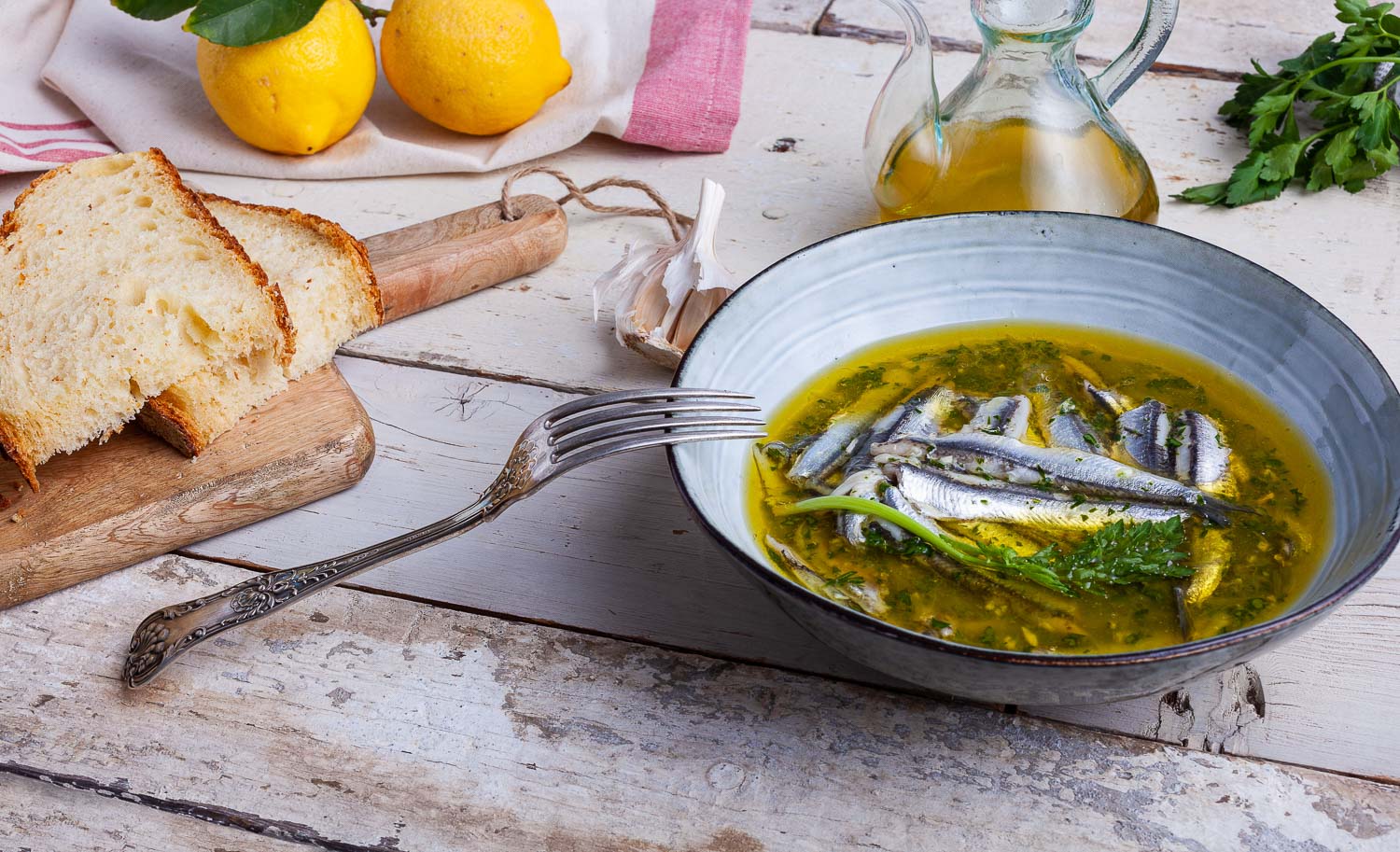 marinated anchovies lemon juice with olive oil garlic parsley traditional mediterranean summer food